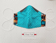 Load image into Gallery viewer, Halloween Face Mask - Removable Nose Wire - Filter Pocket - Adjustable Elastic Ties - Pumpkin Print - Turquoise Polka Dot Lining - BoutiqueCrafts
